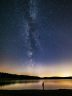 纪录片《光年之外》海报，浩瀚宇宙星系俯瞰图，蓝紫色调震撼壮观